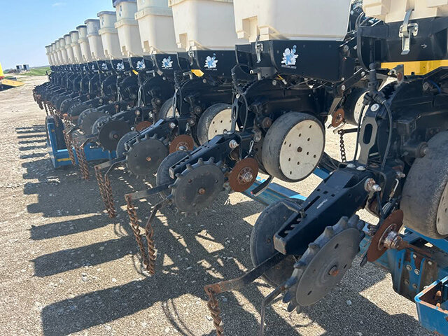 up close view of row units on a Kinze 16 32 planter